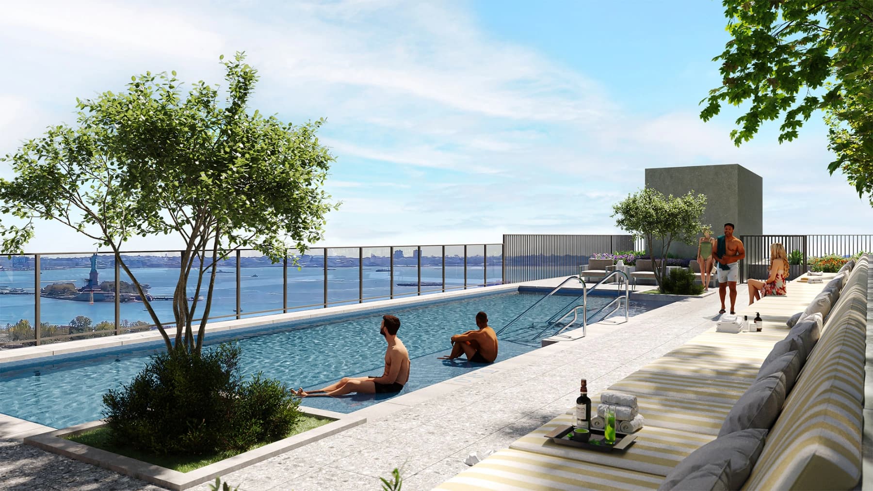 Guests relaxing and swimming at a rooftop pool abroad.